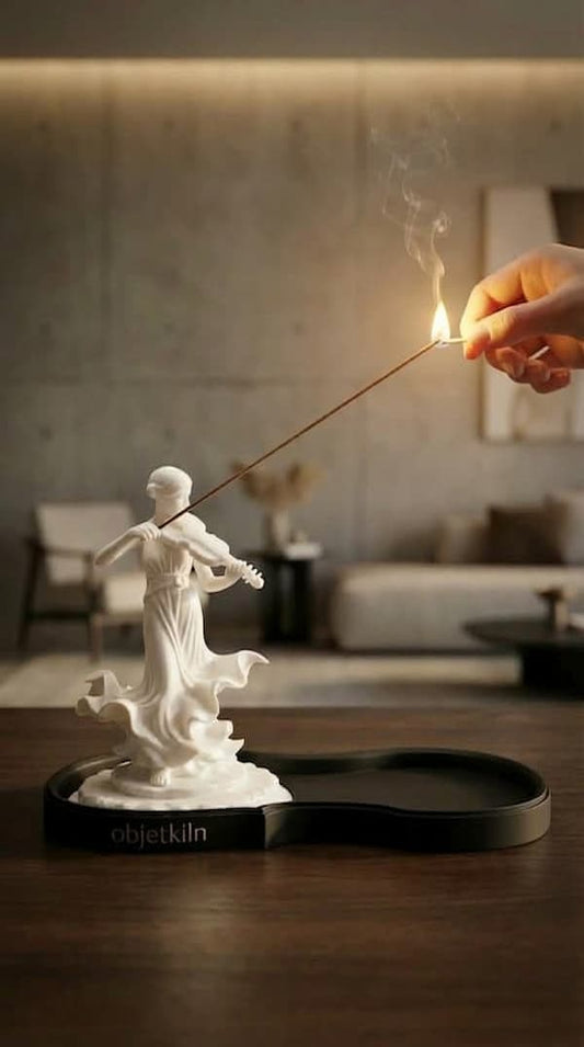 handmade ceramic incense stick holder on table
